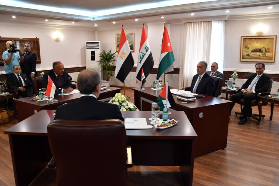جانب من اجتماع وزراء خارجية الأردن ومصر والعراق