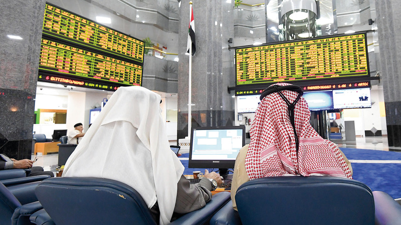 Traders monitoring the stock market at the Abu Dhabi Securities Exchange in Abu Dhabi. January 7, 2018. Photo by Erik Arazas