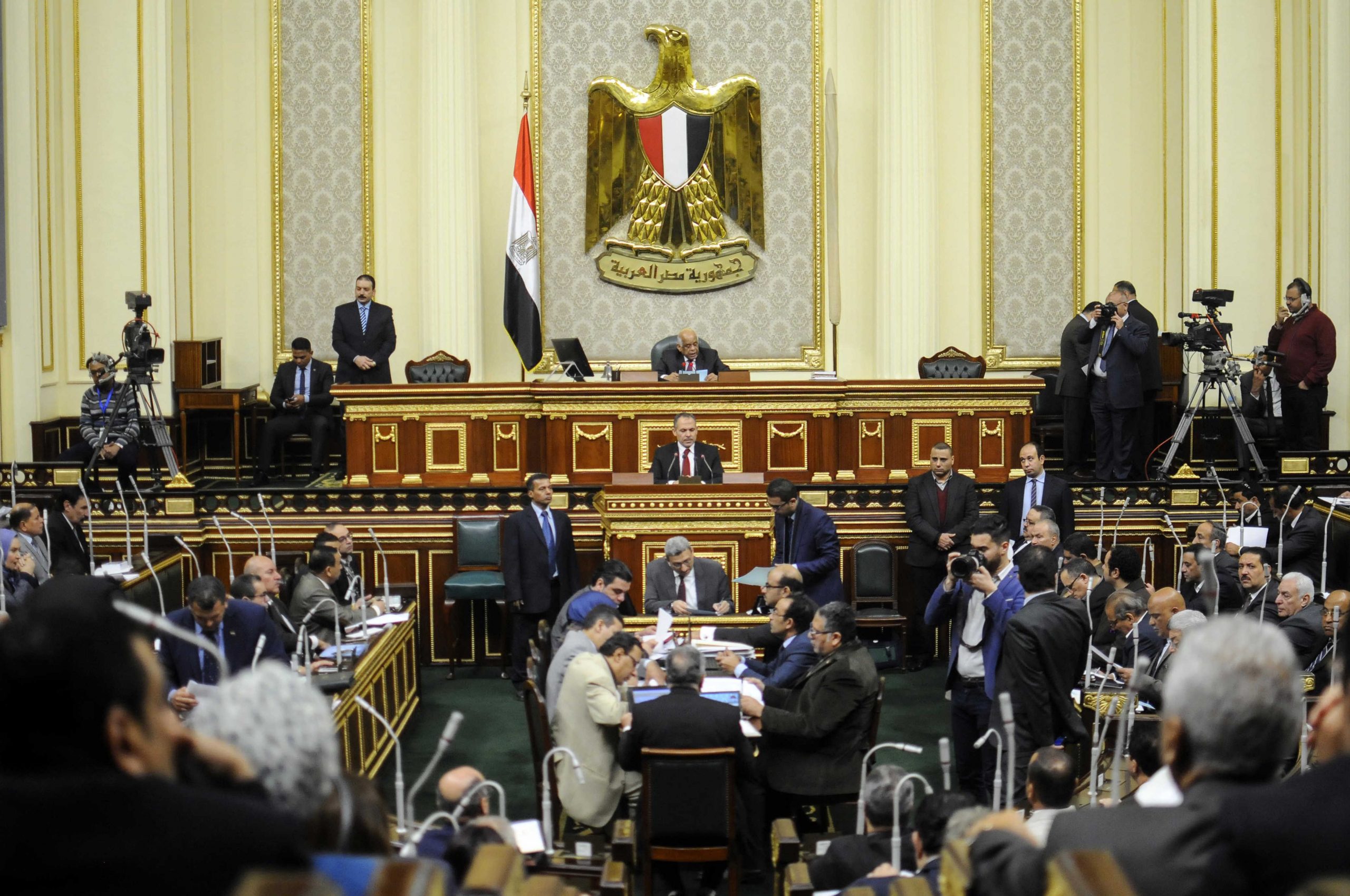 A picture taken on February 13, 2019 shows members of the Egyptian parliament attending a plenary session held to deliberate the proposed constitutional amendments that will increase the country's President term in office from four to six years, in the capital Cairo. (Photo by STRINGER / AFP)